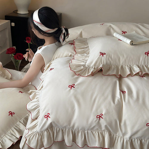 Bedding Set with Ruffles and Embroidered Bows